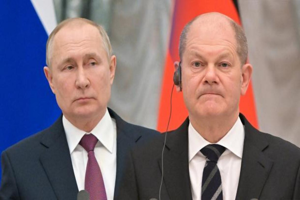 Vladimir Putin, President of Russia and Olaf Scholz, German Chancellor