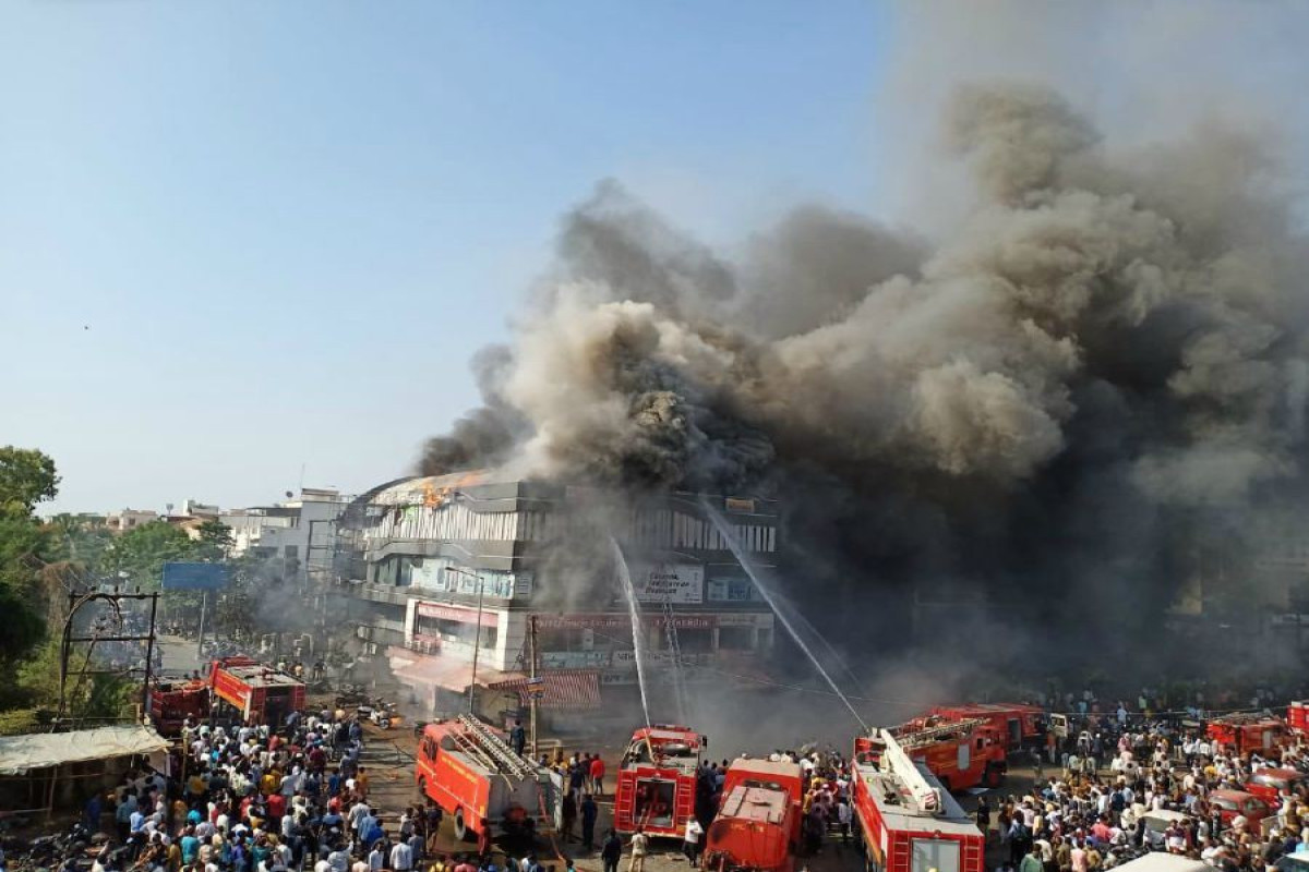 27 dead in massive fire at 4-storey building In India