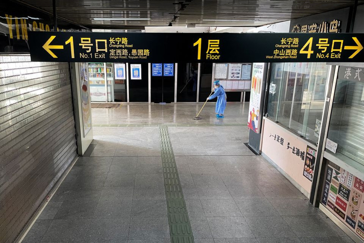 Shanghai reopens some public transport, still on high COVID alert