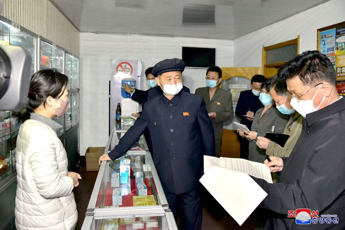 North Korea says new fever cases under 100,000 as virus fight heats up