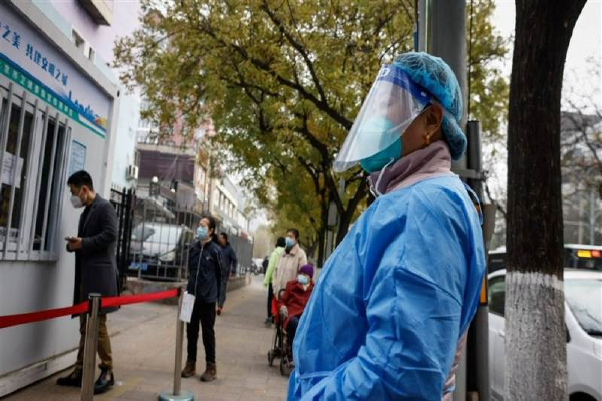 China's COVID cases dip after weekend records