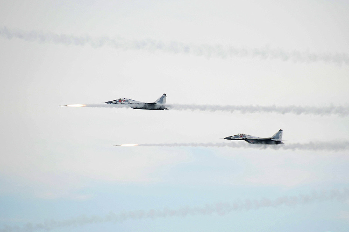 N.Korea fires missile, flies warplanes near border as South imposes sanctions