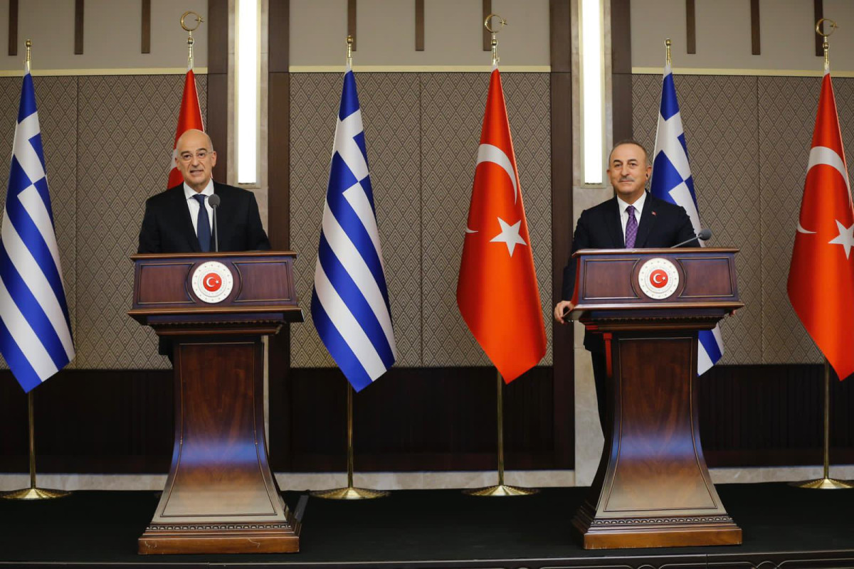 Greek Foreign Minister Nikos Dendias and Turkish Foreign Minister Mevlut Cavusoglu