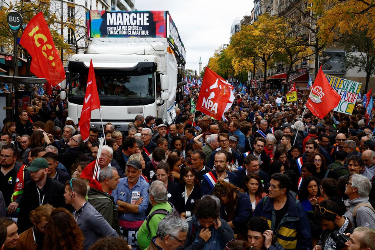 Thousands take to the streets of Paris to protest soaring prices