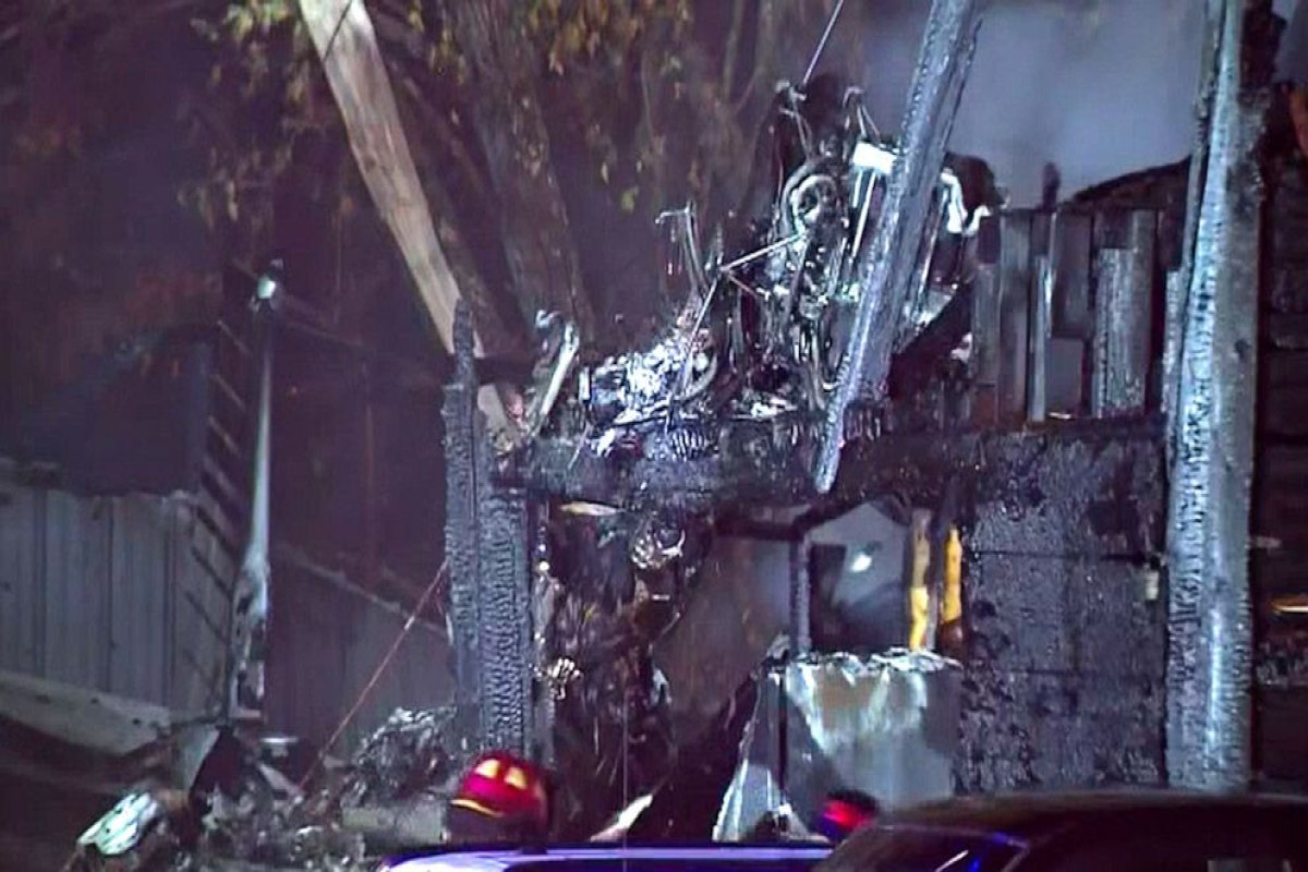 2 dead after plane crashes into home