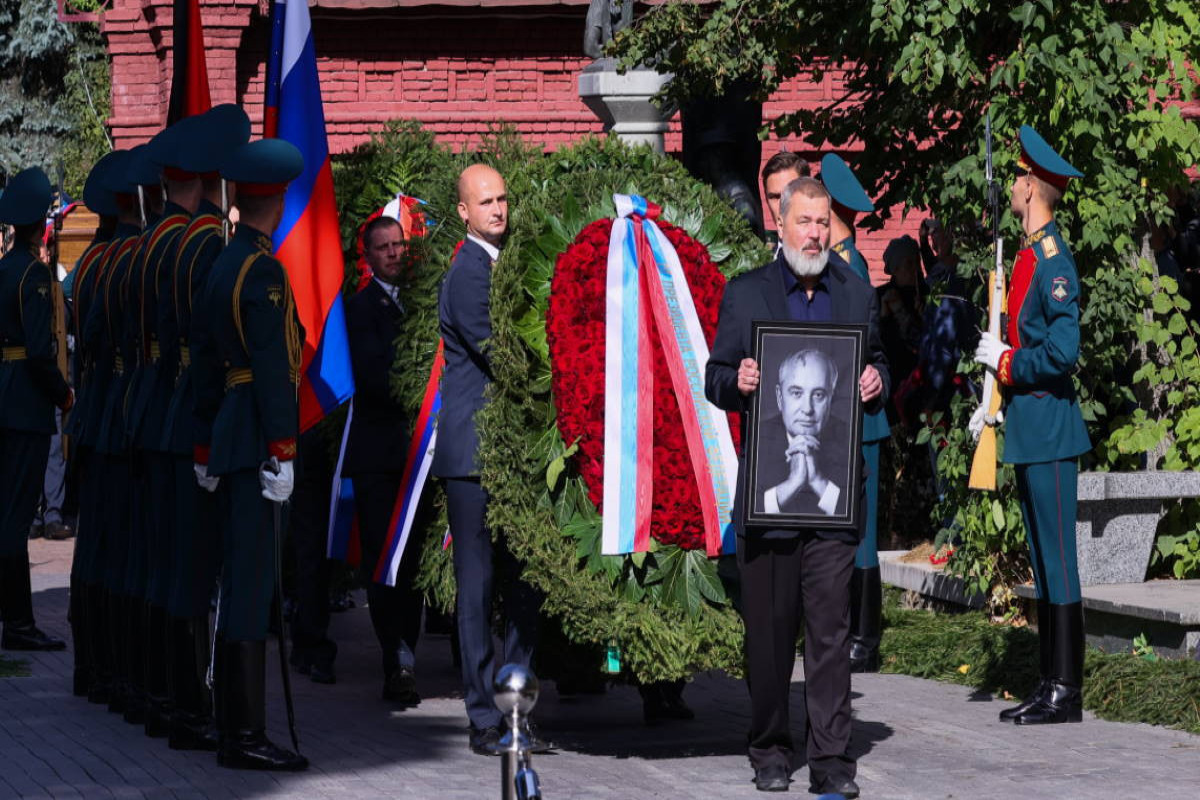 Gorbachev buried in Moscow in funeral snubbed by Putin