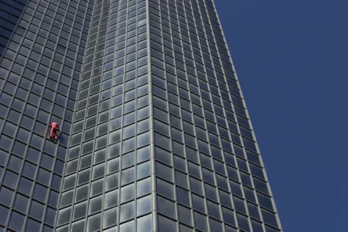 French Spiderman climbs 48-storey skyscraper in Paris aged 60