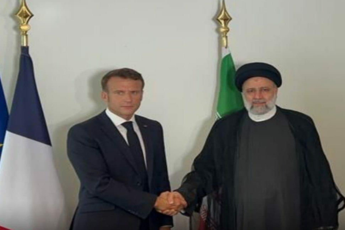 Iranian President Ebrahim Raisi and French President Emmanuel Macron