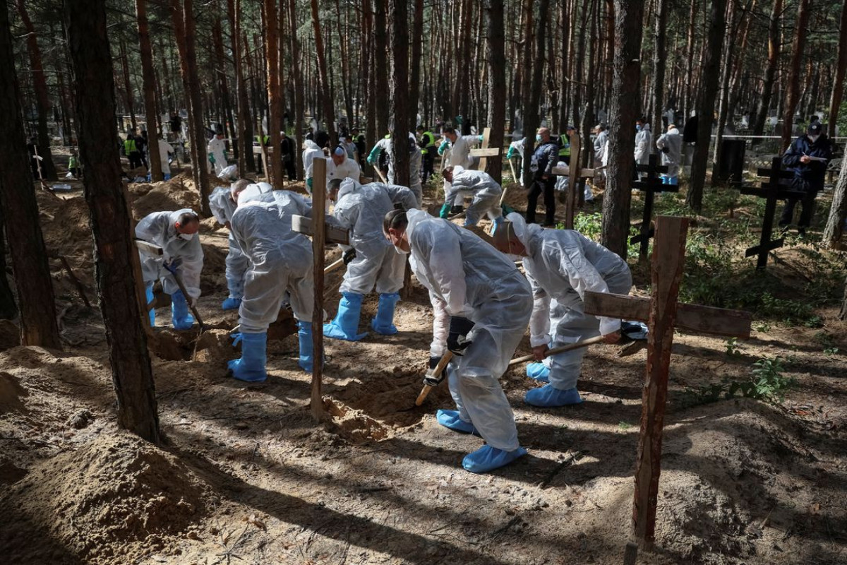 Ukraine's Zelenskyy says two more burial sites found in liberated Izium