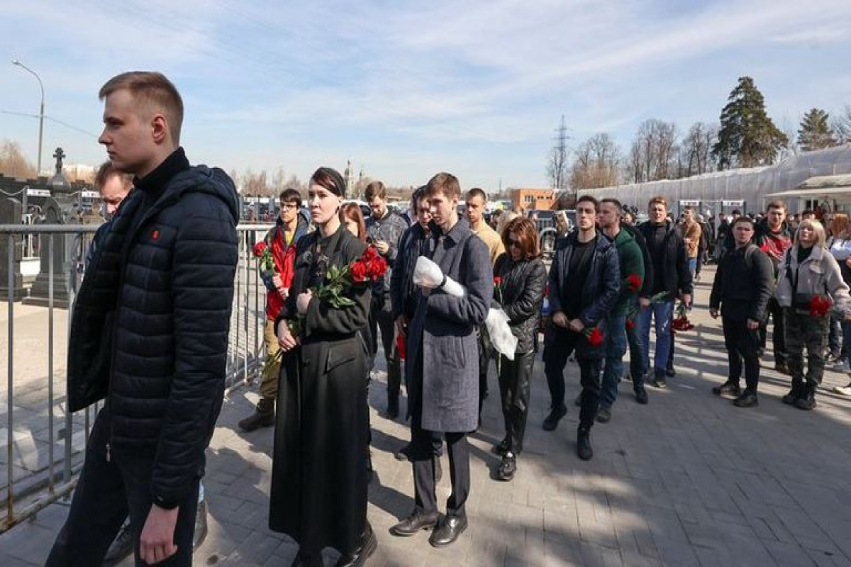Hundreds attend Moscow funeral of pro-war blogger