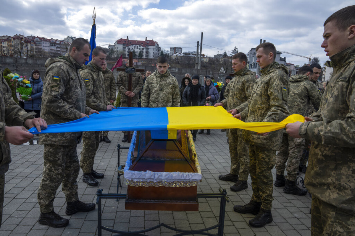 Ukraine retrieves bodies of 82 fallen soldiers
