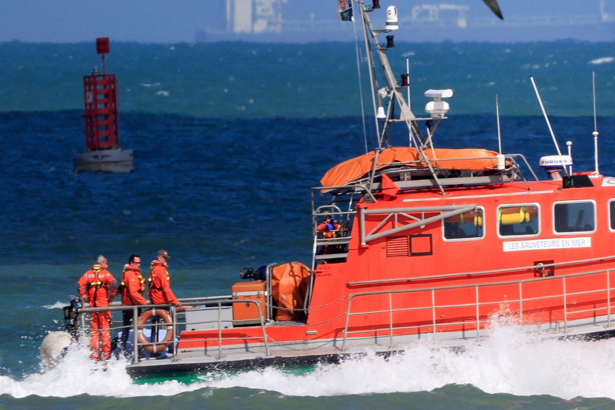 Migrant boat crossing Channel from France capsizes, at least six dead