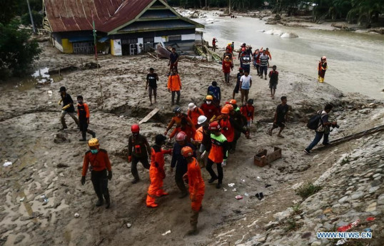 One dead, 11 missing in flash floods around Indonesia's Lake Toba