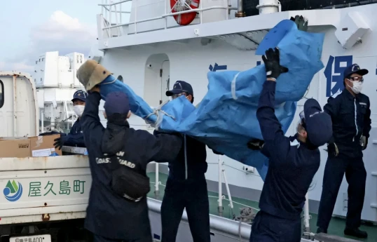 Divers have discovered wreckage, remains from Osprey aircraft that crashed off Japan, Air Force says