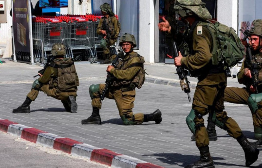 Two hostages confirmed dead, bodies held by Hamas