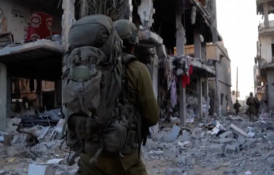 Israel opens aid crossing to Gaza while stepping up bombardment