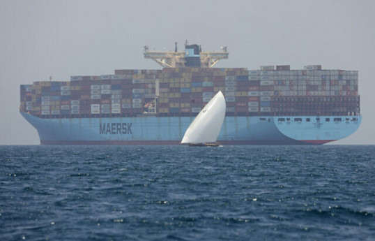 Container ship hit by Houthi missile, US warship shoots down others