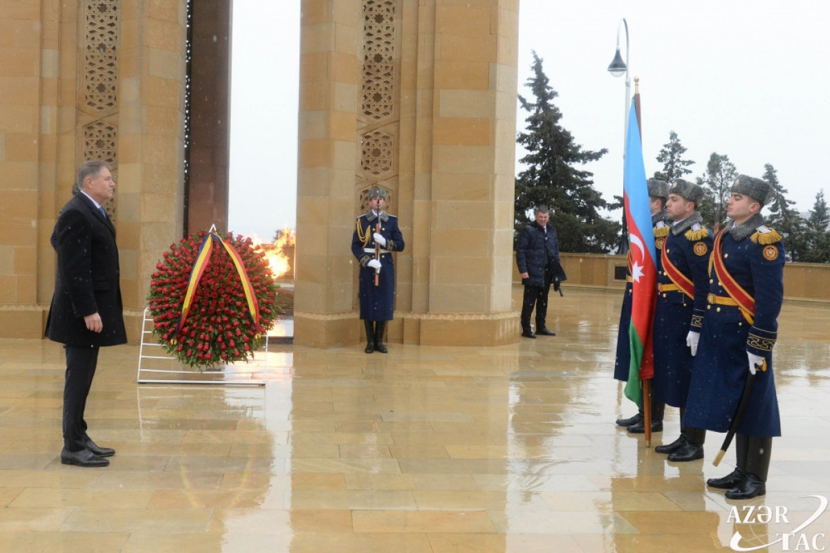 President of Romania Klaus Iohannis visits Alley of Martyrs in Baku