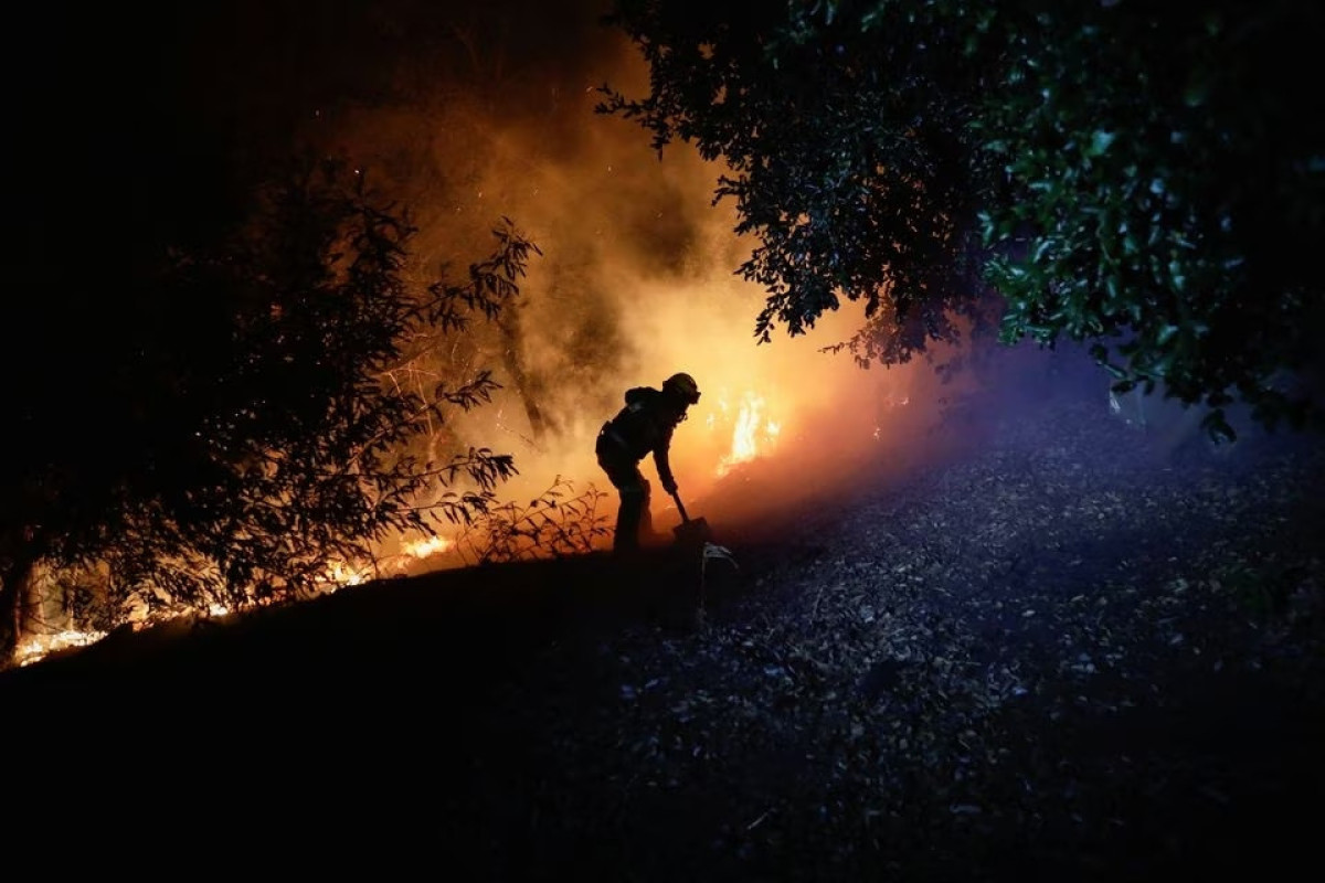 Four dead in Chile as fires blaze through area south of capital