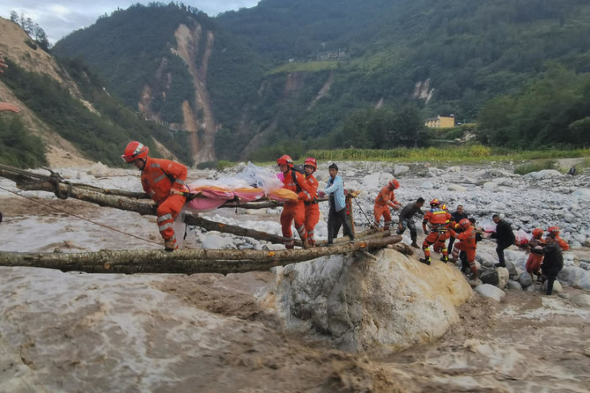 Mudslide disrupts rescue of 53 missing in China mine collapse