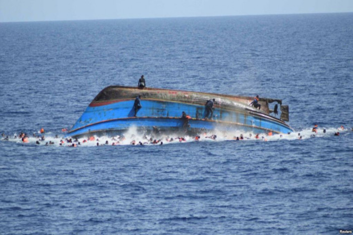 At least 34 dead including a child after boat carrying 100 migrants sinks off Italy