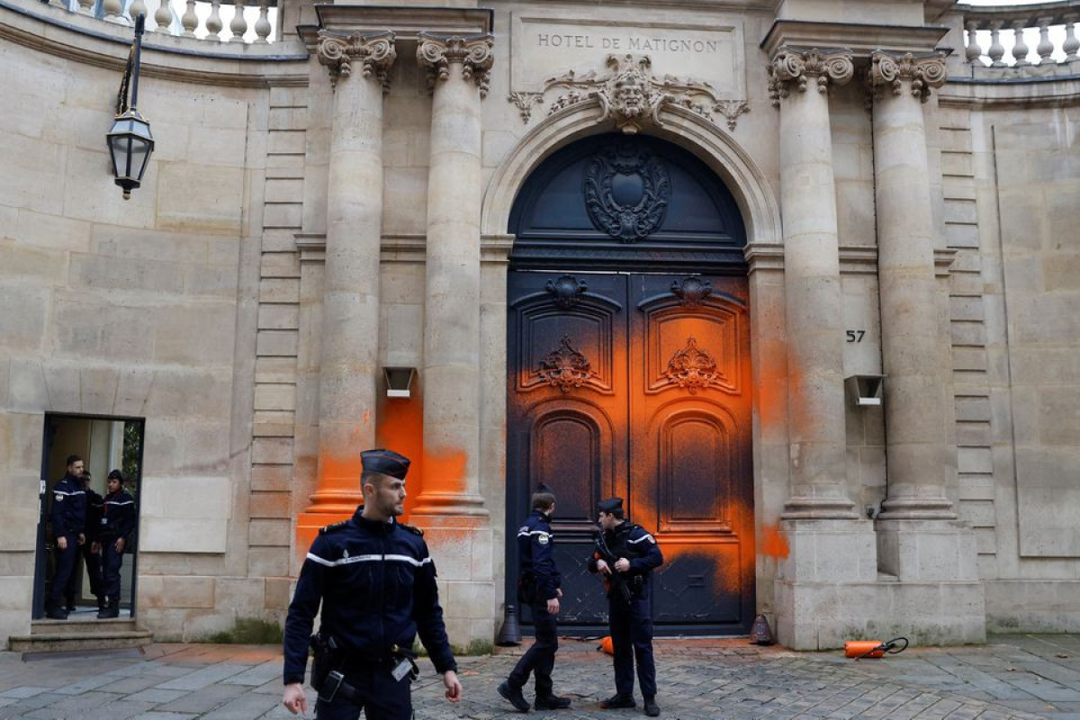 Climate activists spray-paint entrance to French PM's office