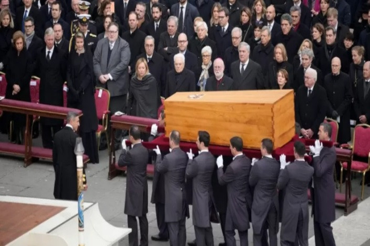 Pope Benedict XVI buried at Vatican after thousands gather for funeral