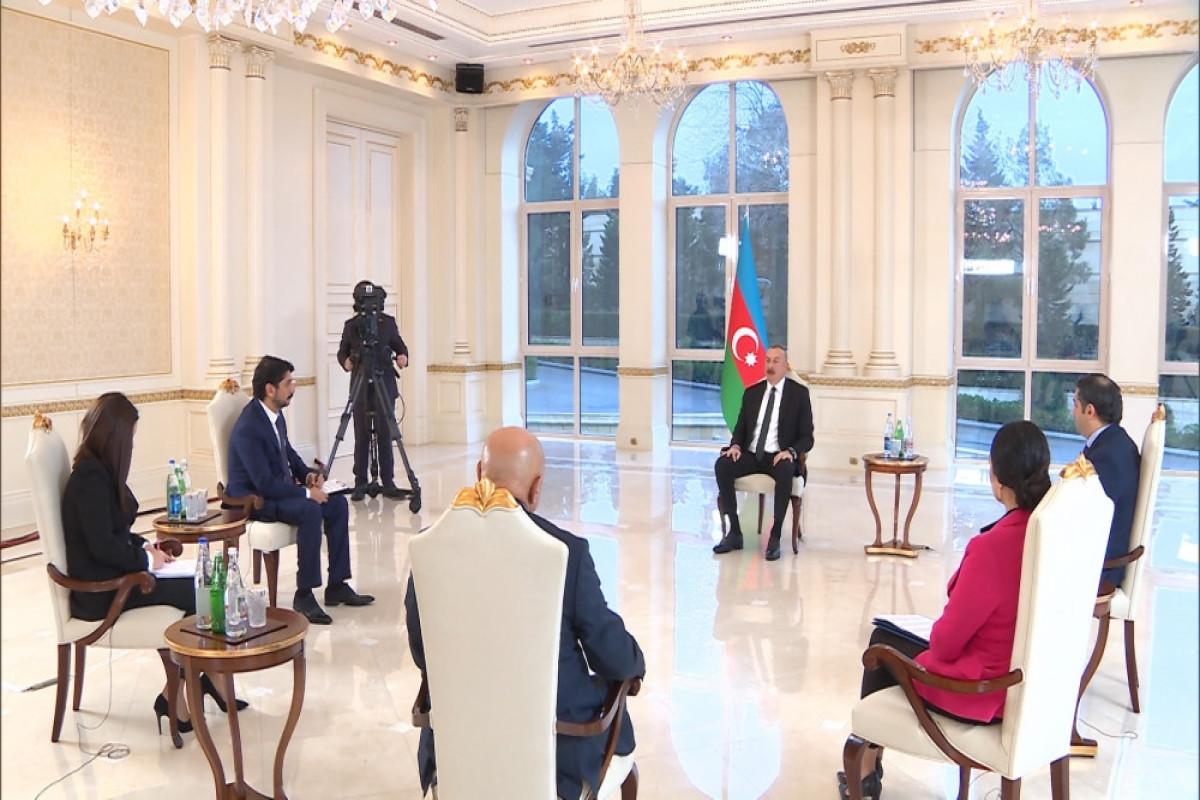 President Ilham Aliyev being interviewed by local TV channels