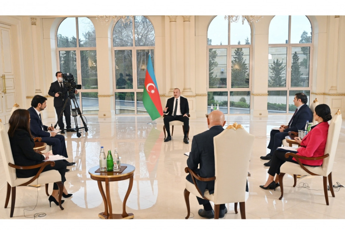 Azerbaijani President Ilham Aliyev being interviewed by local TV channels
