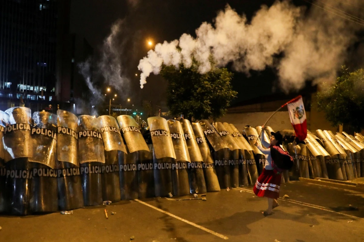 Dozens injured and police stations attacked as protests continue in Peru