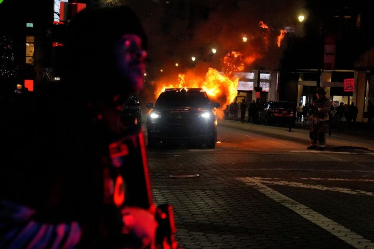 Atlanta protest against shooting death of activist briefly turns violent