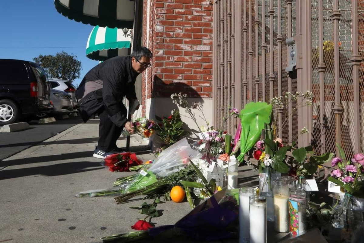 Death toll from California massacre rises to 11 as police look for motive