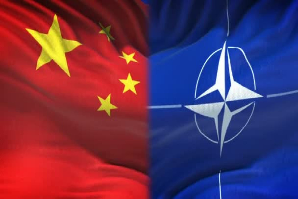 China lashes back at NATO criticism, warns it will protect its rights