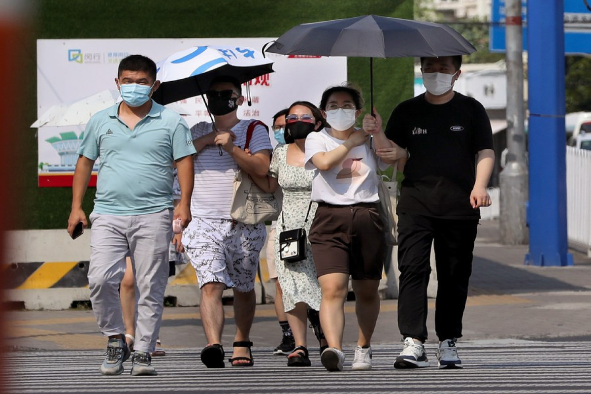 China renews yellow alert for high temperatures