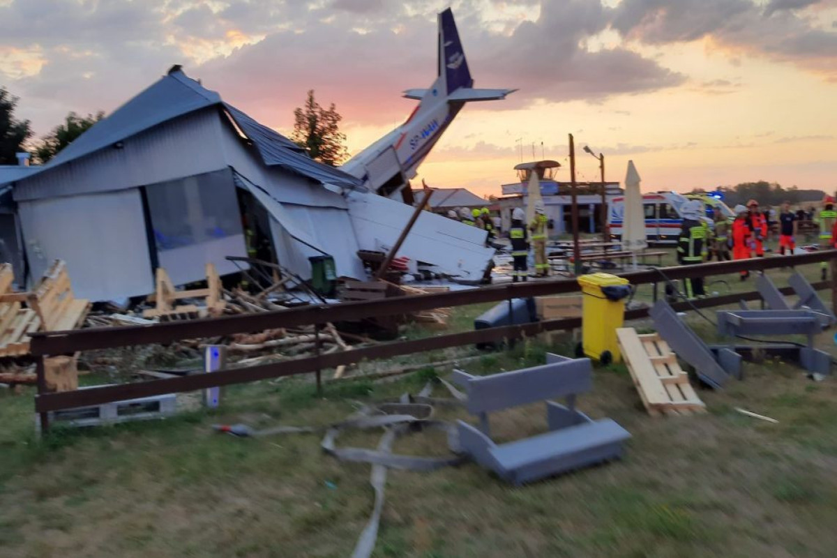 Light aircraft crashes into hangar near Warsaw, killing at least five