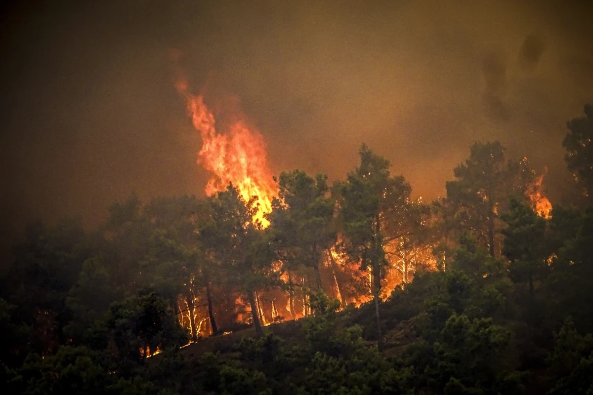 Greek authorities evacuate some 19,000 people as wildfire blazes on the island of Rhodes