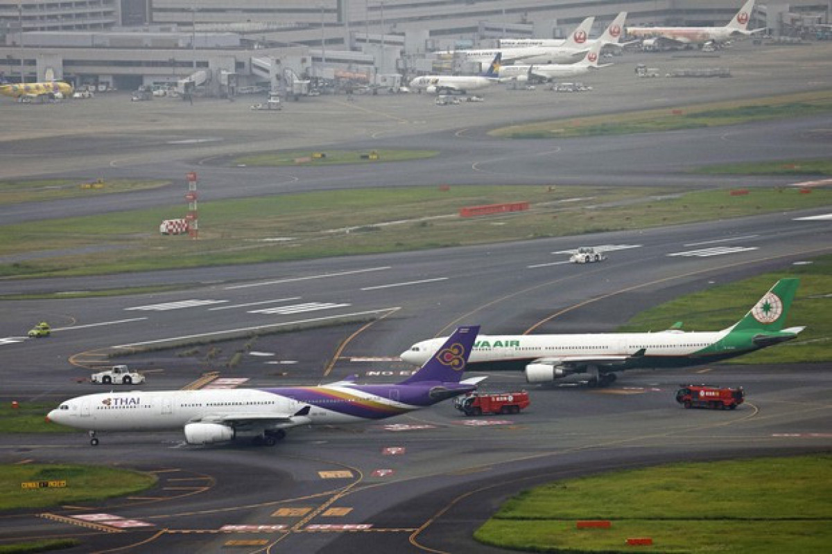 Plane contact leads to runway closure at Tokyo's Haneda airport