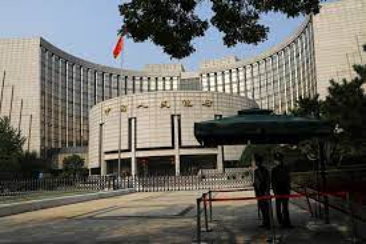 China cuts short-term borrowing costs as economy slows