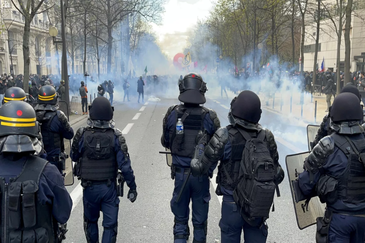 A dozen French police wounded in clashes with protesters opposing rail link in Alps