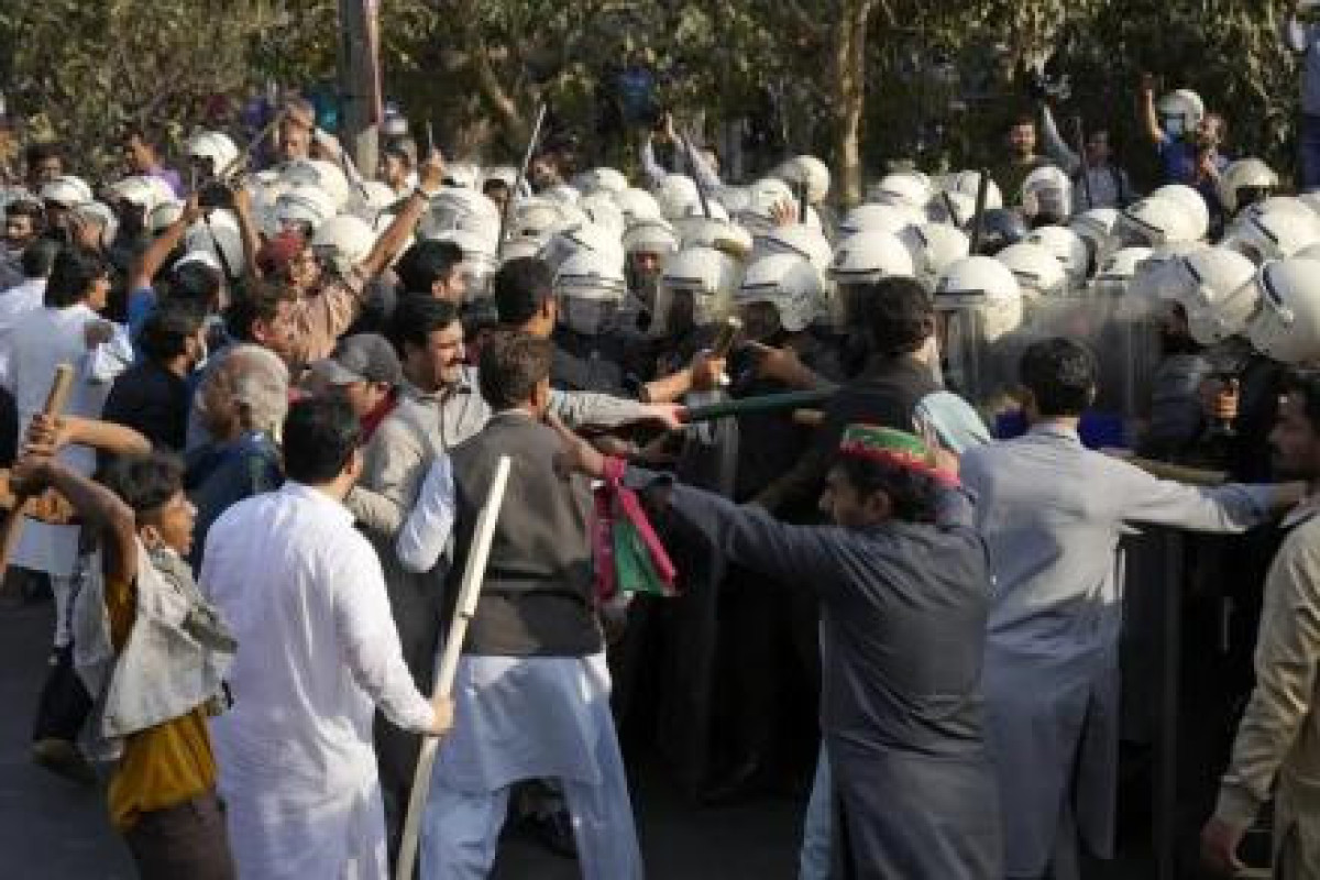 Pakistani police fire tear gas into Imran Khan’s home as defiant former leader resists arrest