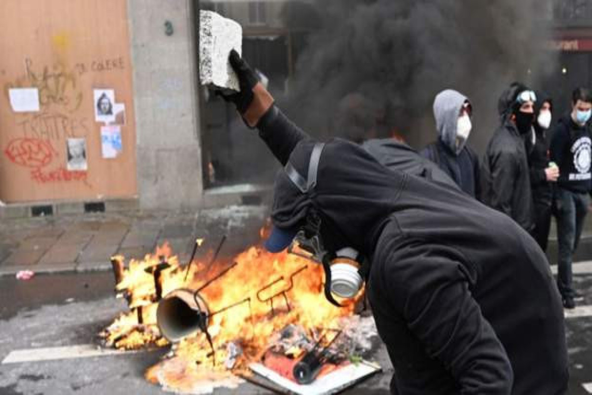 Police in Paris using tear gas