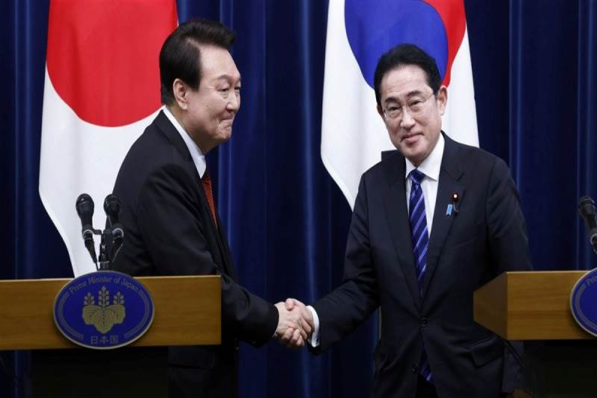 Japan's Kishida returns visit to South Korea