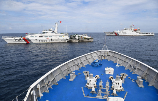 Philippines accuses China of intruding into its waters