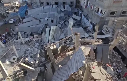 Hamas says strikes on refugee camp kill more than 195 people