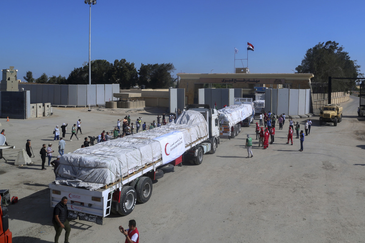 At least 106 trucks with aid crossed into Gaza on Thursday, humanitarian organization says