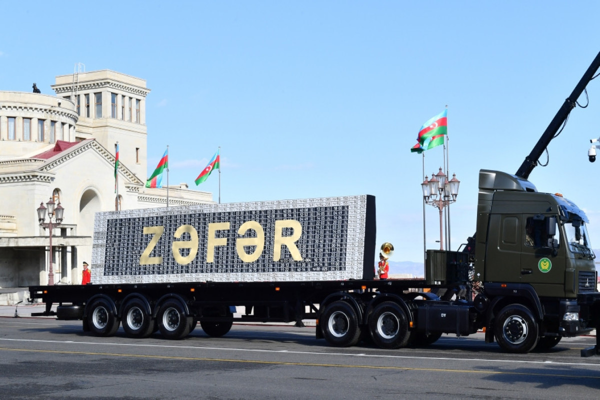 Board made out of plates taken from enemy vehicles was displayed at military parade in Khankandi