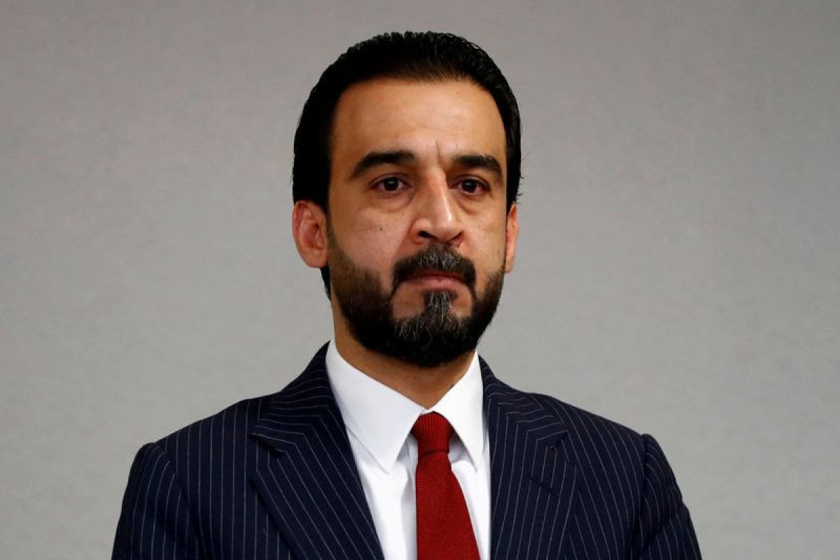 Three Iraqi government ministers resign over house speaker