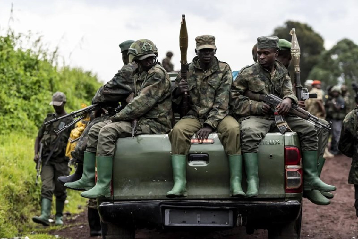Suspected militants kill at least 14 in Congo night raid