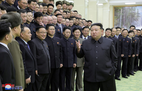 North Korea's Kim inspects spy satellite photos of 'target regions', US bases