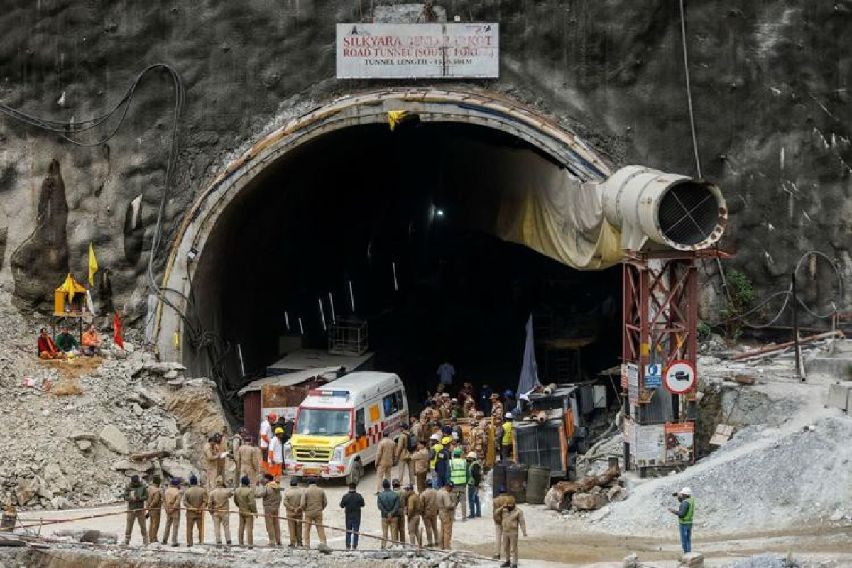Rescuers bring four of 41 trapped workers out of tunnel in Himalayas